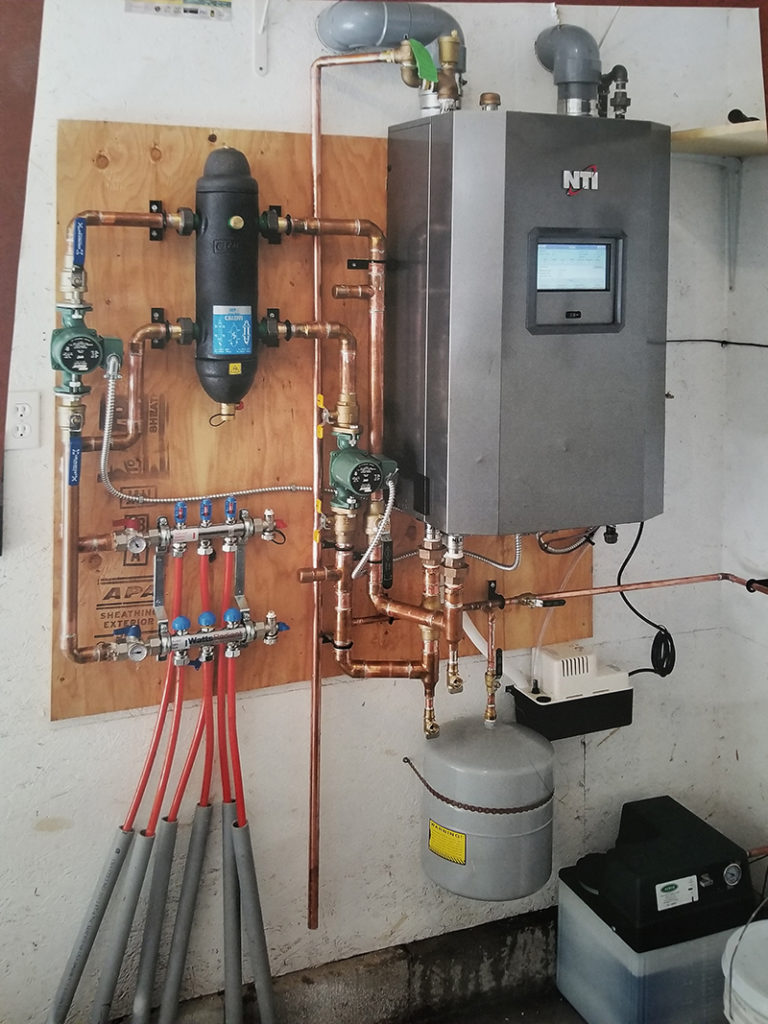High Efficiency Boiler Connected to Infloor Heating Lines